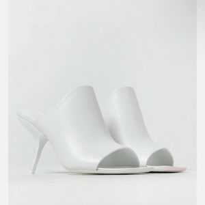Salvatore Ferragamo White Mules Sleek and Stylish